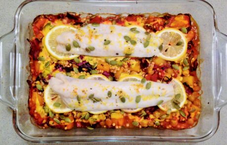 baked fish on vegetables