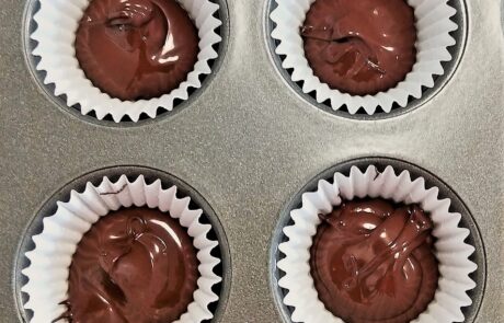 melted chocolate drizzled into the liners