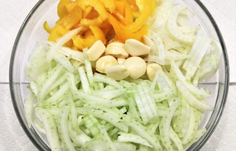 sliced fennel, cabbage, bell pepper and peeled garlic