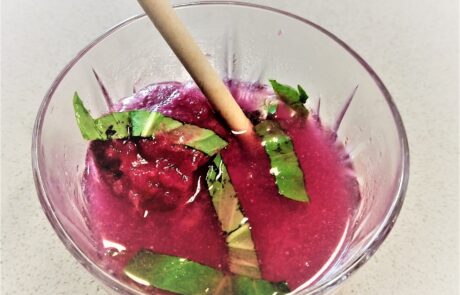 beet sorbet cubes in cocktail with gin, seltzer and fresh basil