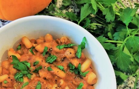 pumpkin based pasta e ceci topped with parsley